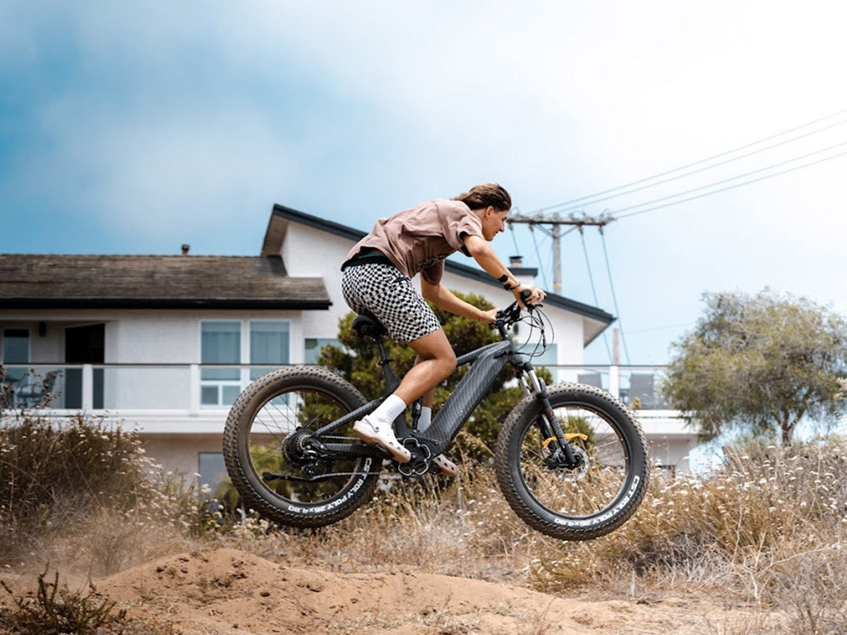 Himiway D7 Upgraded Full Suspension Fat Tire Electric Mountain Bike lifestyle jumping