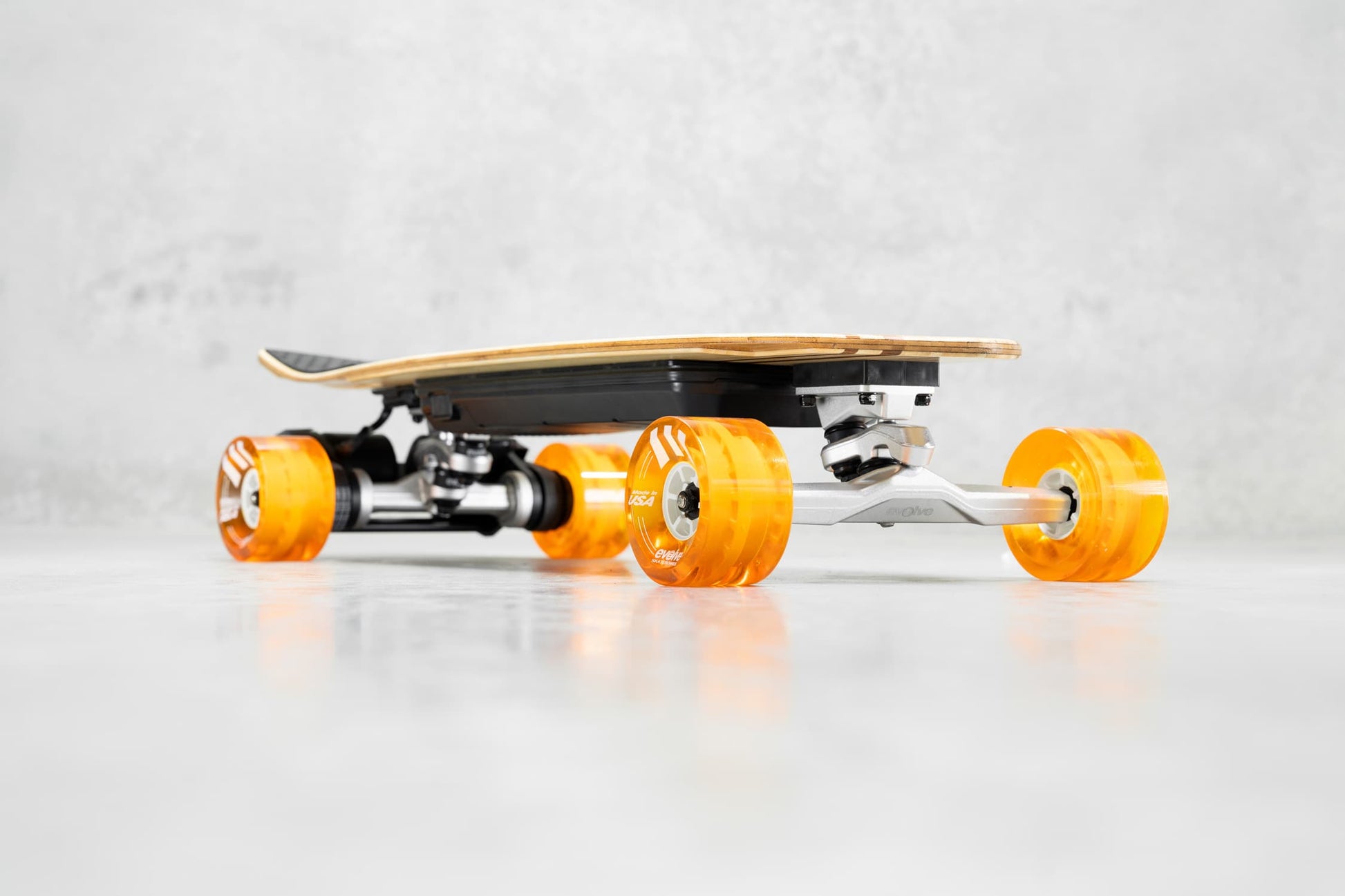 Evolve Skateboards Stoke X Bamboo Cruiser Electric Skateboard Orange Wheels