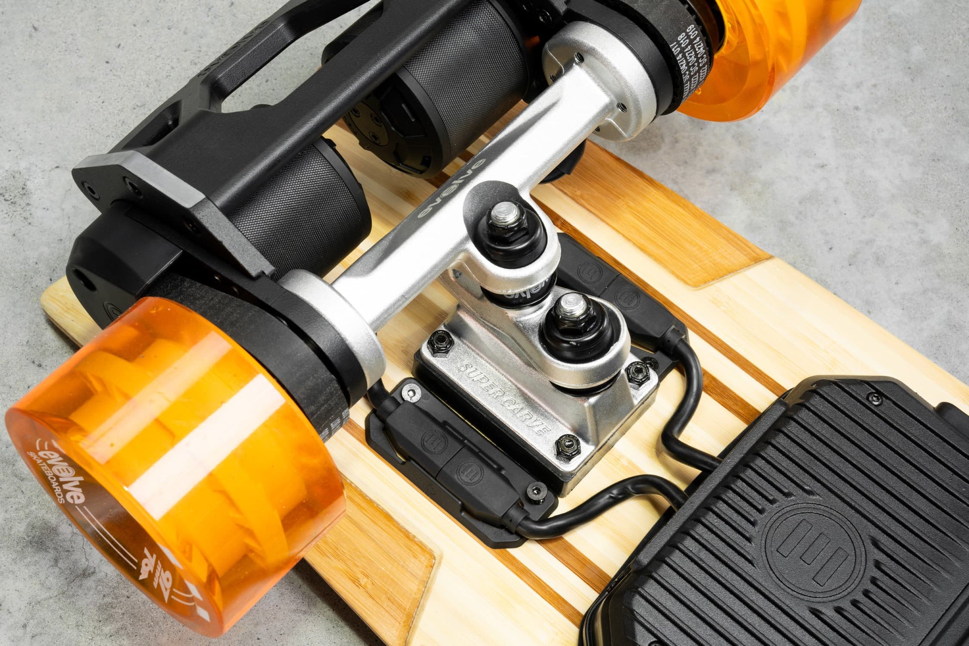 Evolve Skateboards Stoke X Bamboo Cruiser Electric Skateboard Orange Wheels