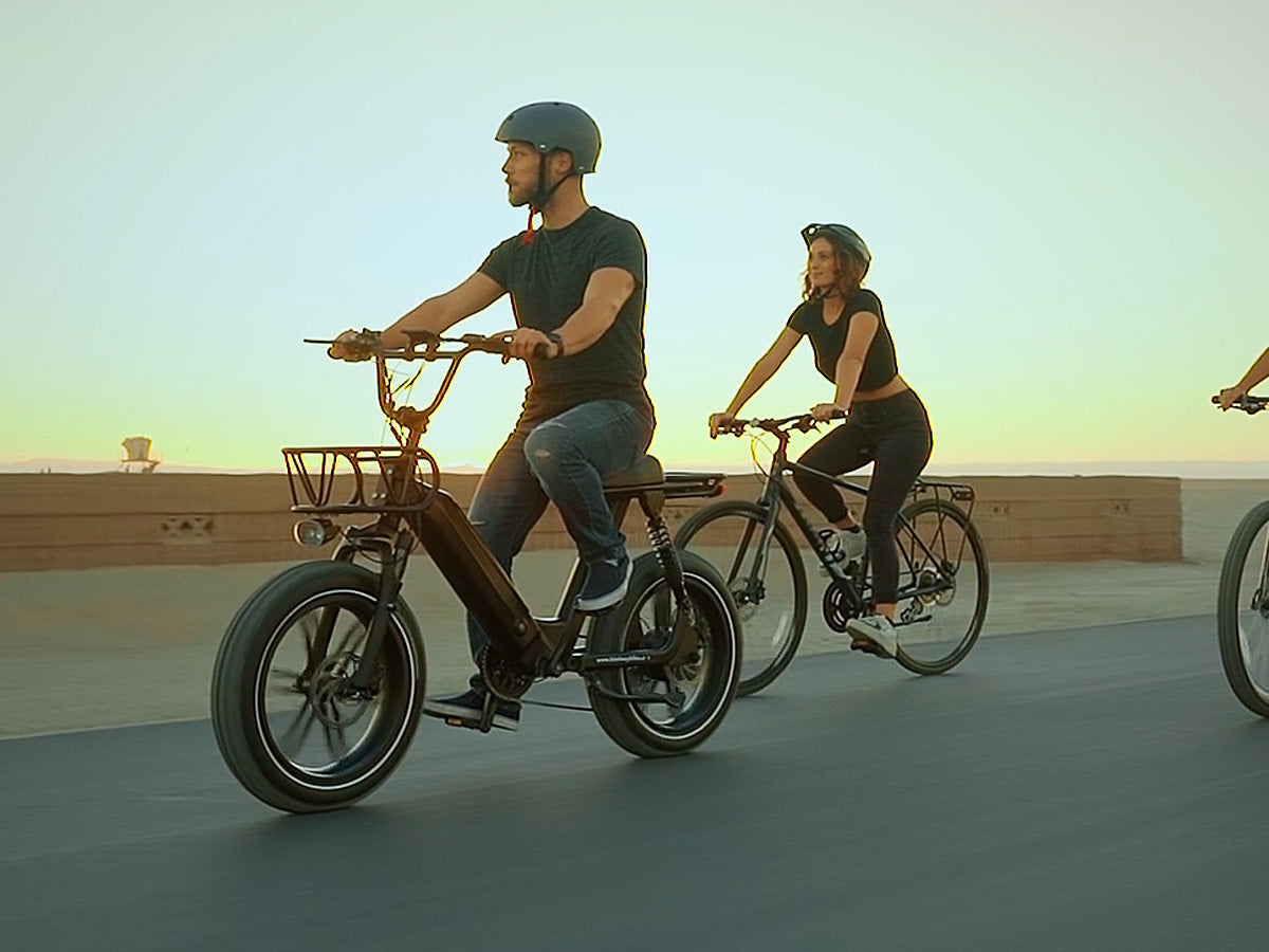 Himiway Escape Pro 750 Watt Full Suspension Moped Style Tote Goat Electric Ebike riding with group