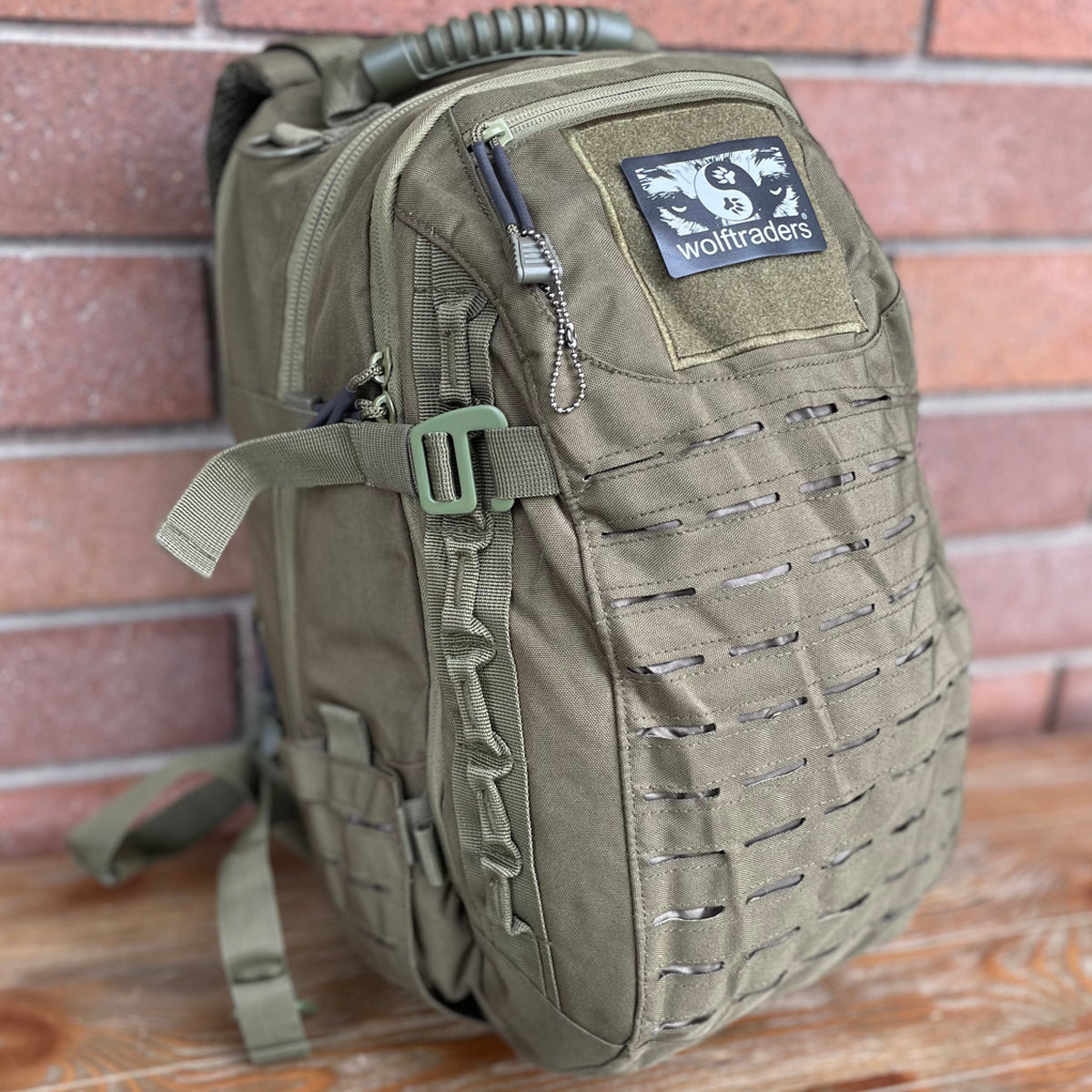 Wolftraders Wolf Mission Tactical Laser cut hydration compatible backpack olive draft green Left Side Molly strap